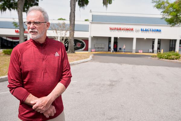 Early voter Gary Caples stands outside the Supervisor of Elections office Tuesday, March 25, 2025, in DeLand, Fla. (AP Photo/John Raoux)