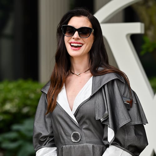 Anne Hathaway attends the Louis Vuitton Cruise 2027 Collection fashion show at The Frick Collection on Wednesday, May 20, 2026, in New York. (Photo by Evan Agostini/Invision/AP)