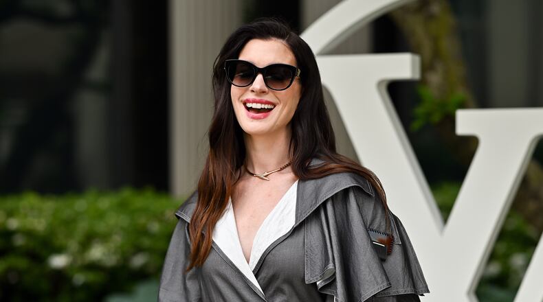 Anne Hathaway attends the Louis Vuitton Cruise 2027 Collection fashion show at The Frick Collection on Wednesday, May 20, 2026, in New York. (Photo by Evan Agostini/Invision/AP)