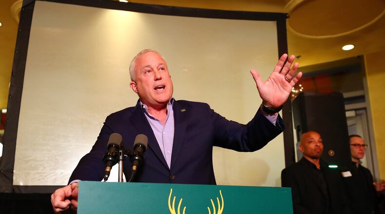 Bill White, leader of the Buckhead cityhood movement, addresses supporters during a fundraiser last month at Bistro Niko in Buckhead. White's leadership role in the movement has drawn new attention to his finances, including a settlement agreement and his work on veterans issues. (Curtis Compton / Curtis.Compton@ajc.com)