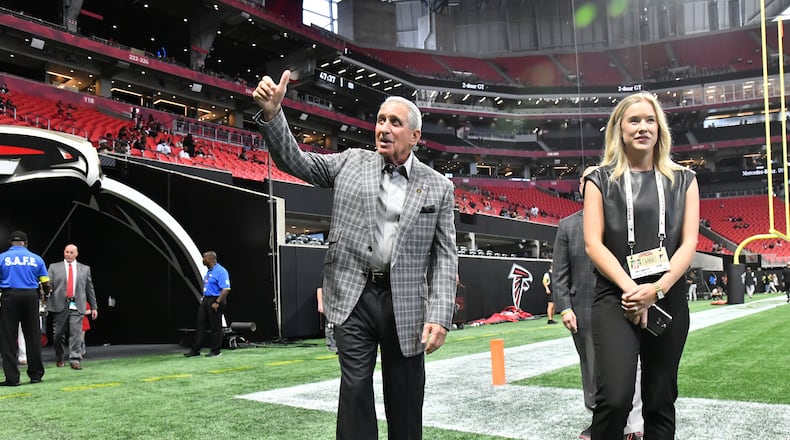 Falcons owner Arthur Blank gives a thumbs-up to fans before a game. (Hyosub Shin / Hyosub.Shin@ajc.com)