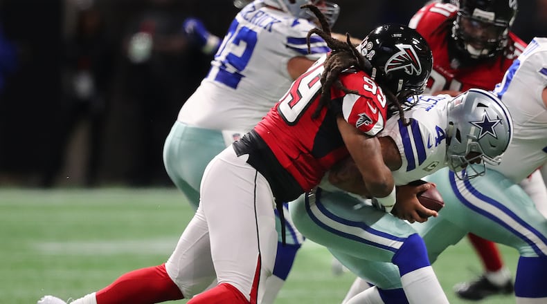 November 12, 2017 Atlanta : Falcons defensive end Adrian Clayborn sacks Cowboys quarterback Dak Prescott during the first half in a NFL football game on Sunday, November 12, 2017, in Atlanta.    Curtis Compton/ccompton@ajc.com