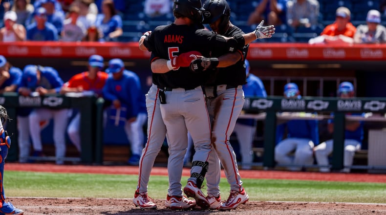 Christian Adams celebrates a three-run homer in Georgia baseball's Sunday sweep of No. 13 Florida at Condron Family Ballpark in Gainesville, Florida. (Conor Dillon/UGAA)