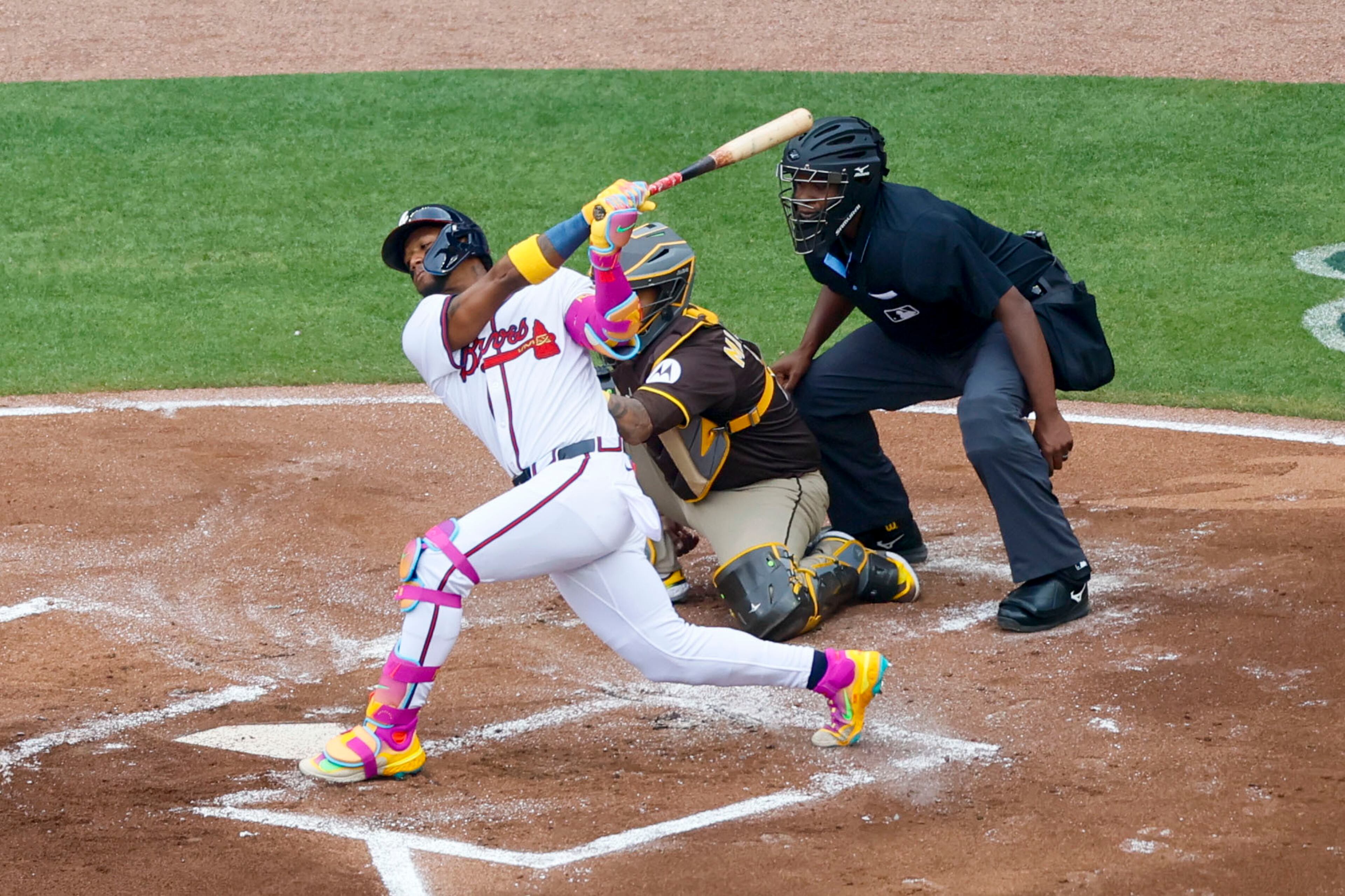 Atlanta Braves' Ronald Acuña Jr. (13) follows through on a pitch during the first inning of a baseball game against the San Diego Padres on Sunday, May 25, 2025, in Atlanta. (Miguel Martinez/Atlanta Journal-Constitution via AP)