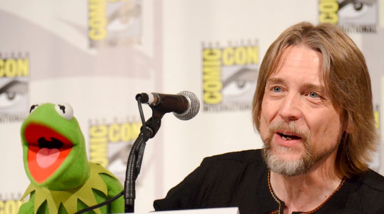 FILE - In this July 11, 2015, file photo, Kermit the Frog, left, and puppeteer Steve Whitmire attend "The Muppets" panel on day 3 of Comic-Con International in San Diego. ABC News and The Hollywood Reporter reported July 10, 2017, that Whitmire is no longer performing the character. (Photo by Tonya Wise/Invision/AP, File)