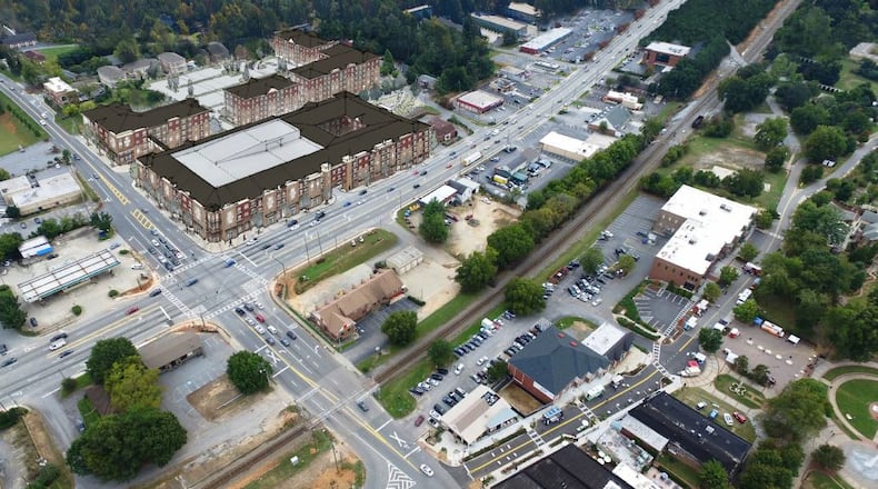 The aging Proctor Square retail center will be demolished to make room for The Village in Duluth, a $64 million mixed-use project. (Credit: City of Duluth)
