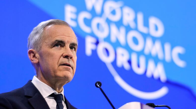 FILE - Canada's Prime Minister Mark Carney speaks during the Annual Meeting of the World Economic Forum in Davos, Switzerland, Jan. 20, 2026. (AP Photo/Markus Schreiber, File)