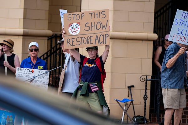 Demonstrators rally for support of the CDC during a meeting of the Advisory Committee in Immunization Practices, Wednesday, June 25, 2025, in Atlanta. (AP Photo/Mike Stewart)