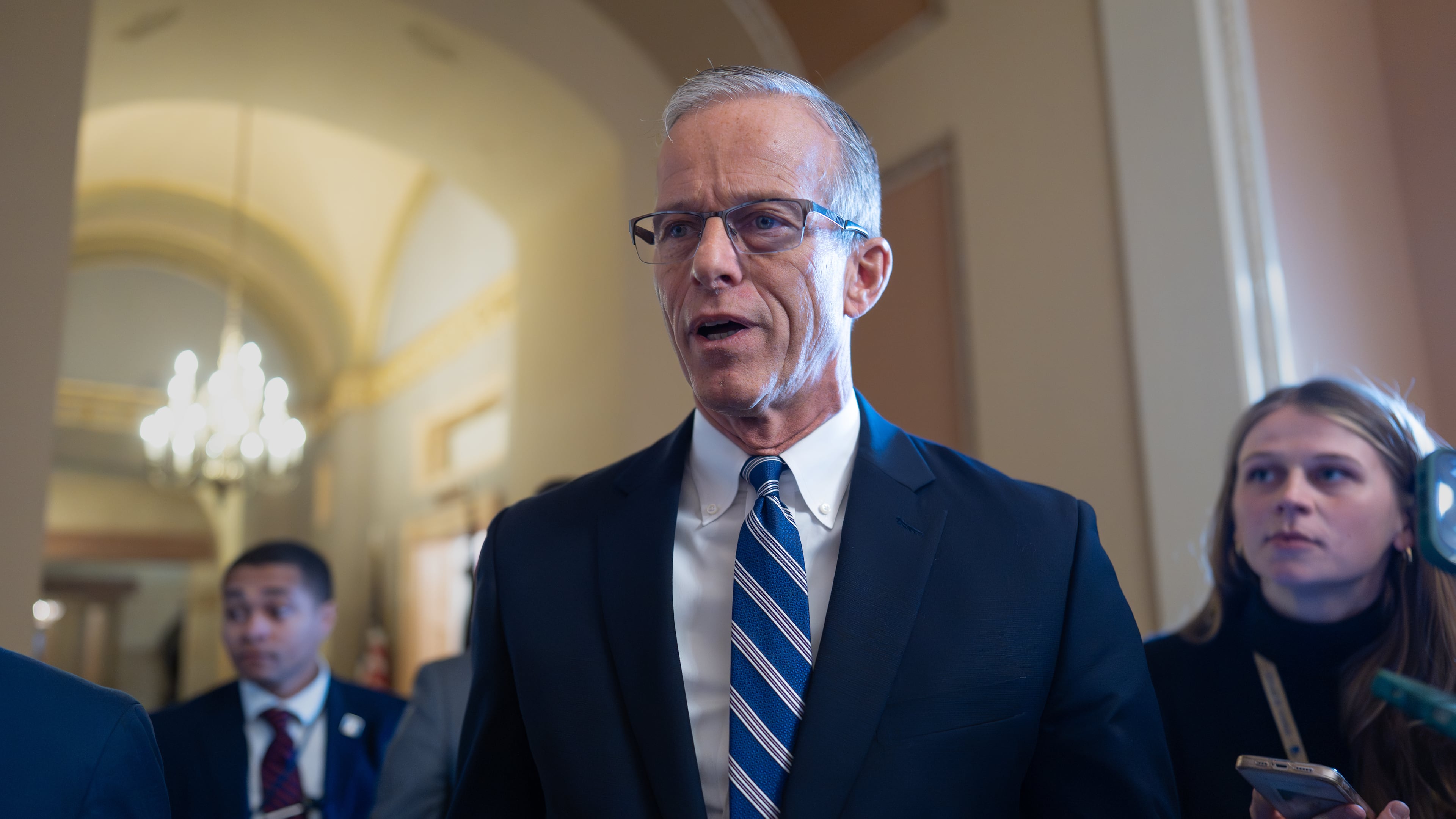 Speaking to reporters, Senate Majority Leader John Thune, R-S.D., responds to Senate Democratic Leader Chuck Schumer to reopen the government if Republicans extend expiring health care subsidies for one year, at the Capitol in Washington, Friday, Nov. 7, 2025, day 38 of the government shutdown. (AP Photo/J. Scott Applewhite)