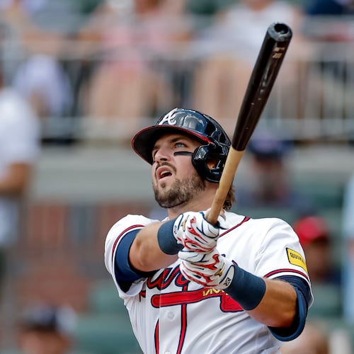 Atlanta Braves' Austin Riley follows through on a solo home run against the Texas Rangers during the second inning of a baseball game, Sunday, July 19, 2026, in Atlanta. (AP Photo/Erik S. Lesser)