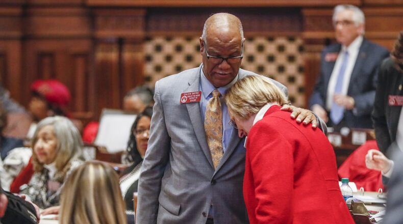 State Rep. Sharon Cooper (R-Marietta) is congratulated by Rep. Calvin Smyre, (D-Columbus), after the passage of a bill on reform of senior care in Georgia. Smyre spoke in support of the bill. The Georgia house passed HB 987, sponsored by Cooper, to provide additional measures for the protection of elderly persons and better regulate assisted living facilities and large personal care homes. Bob Andres / robert.andres@ajc.com