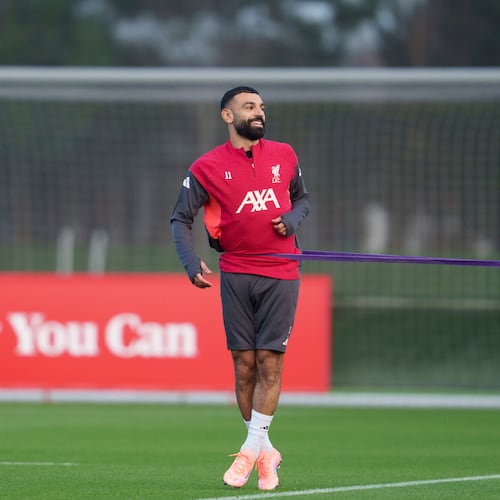Liverpool's Mohamed Salah smiles as he takes part in a training session in Liverpool, England, Monday, Dec. 8, 2025. (AP Photo/Jon Super)