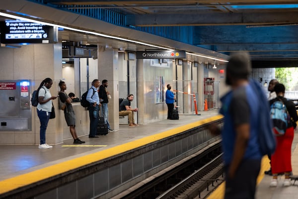 Commuters wait at Five Points MARTA station Atlanta on Tuesday, Sept. 30, 2025. (Arvin Temkar/AJC)