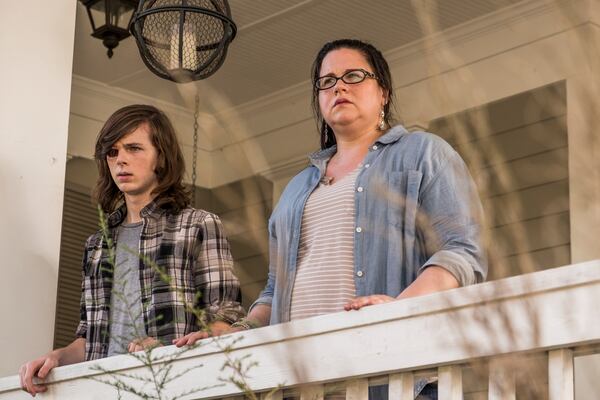 Chandler Riggs as Carl Grimes, Ann Mahoney as Olivia - The Walking Dead _ Season 7, Episode 8 - Photo Credit: Gene Page/AMC
