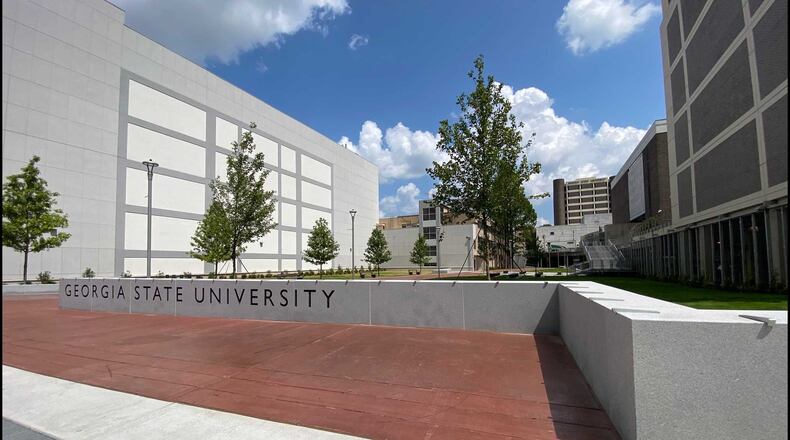 Georgia State University created this greenspace on its Atlanta campus where Kell Hall once stood. The greenspace is new on campus, and Georgia State administrators hope it will be a gathering spot for students. ERIC STIRGUS/ESTIRGUS@AJC.COM.