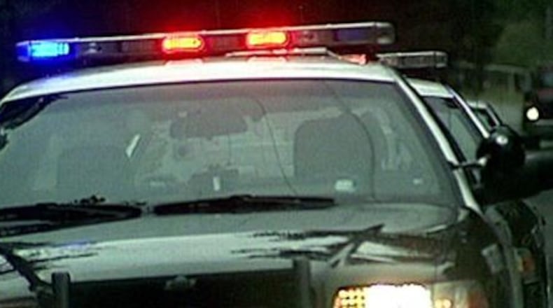 Investigators said the woman ran the mother over as she drove away in the stolen vehicle.