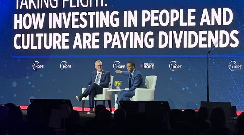 Delta CEO Ed Bastian speaks on stage with Operation HOPE CEO John Hope Bryant at the 2023 HOPE Global Forum.