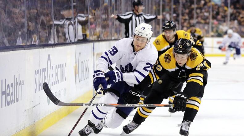 BOSTON, MA - APRIL 12: Charlie McAvoy #73 of the Boston Bruins and William Nylander #29 of the Toronto Maple Leafs battle for control of the puck during the second period of Game One of the Eastern Conference First Round during the 2018 NHL Stanley Cup Playoffs at TD Garden on April 12, 2018 in Boston, Massachusetts. (Photo by Maddie Meyer/Getty Images)