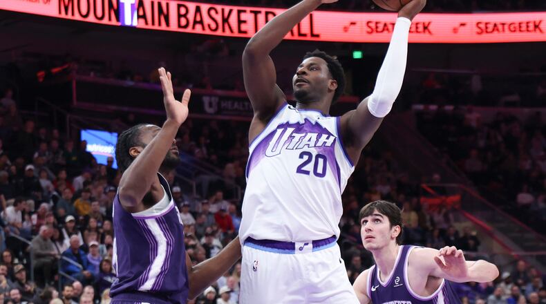 Utah Jazz forward Jaren Jackson Jr. (20) goes up for a shot against the Sacramento Kings during the second half of an NBA basketball game, Wednesday, Feb. 11, 2026, in Salt Lake City. (AP Photo/Rob Gray)