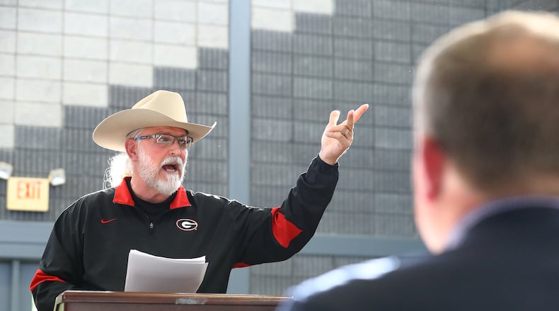 John Eunice, the deputy director Georgia's Environmental Protection Division, listens as Oconee County resident Edwin Snell, addresses the site design and environmental committee about the planned $5 billion Rivian electric vehicle plant on Monday, April 18, 2022, in Monroe. Curtis Compton / Curtis.Compton@ajc.com
