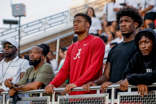 Xavier Griffin, a former Gainesville player now at Alabama, watches the game between Buford and Gainesville on Aug. 22, 2026. (Erik S. Lesser for the AJC)
