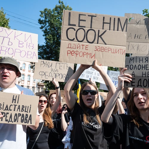 Ukrainians gather to denounce President Volodymyr Zelenskyy's decision to dismiss Defense Minister Mykhailo Fedorov after six months in the post, Kyiv, Ukraine, Thursday, July 16, 2026. (AP Photo/Danylo Antoniuk)