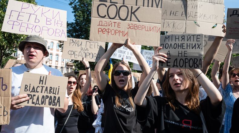 Ukrainians gather to denounce President Volodymyr Zelenskyy's decision to dismiss Defense Minister Mykhailo Fedorov after six months in the post, Kyiv, Ukraine, Thursday, July 16, 2026. (AP Photo/Danylo Antoniuk)