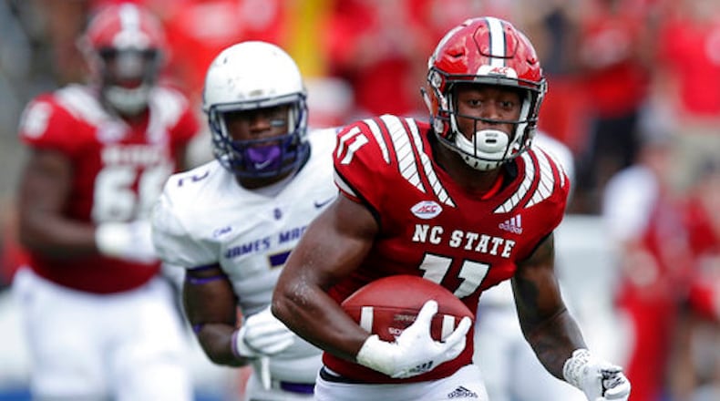 North Carolina State's Jakobi Meyers (11) runs the ball against James Madison during the first half an NCAA college football game in Raleigh, N.C., Saturday, Sept. 1, 2018. (AP Photo/Gerry Broome)
