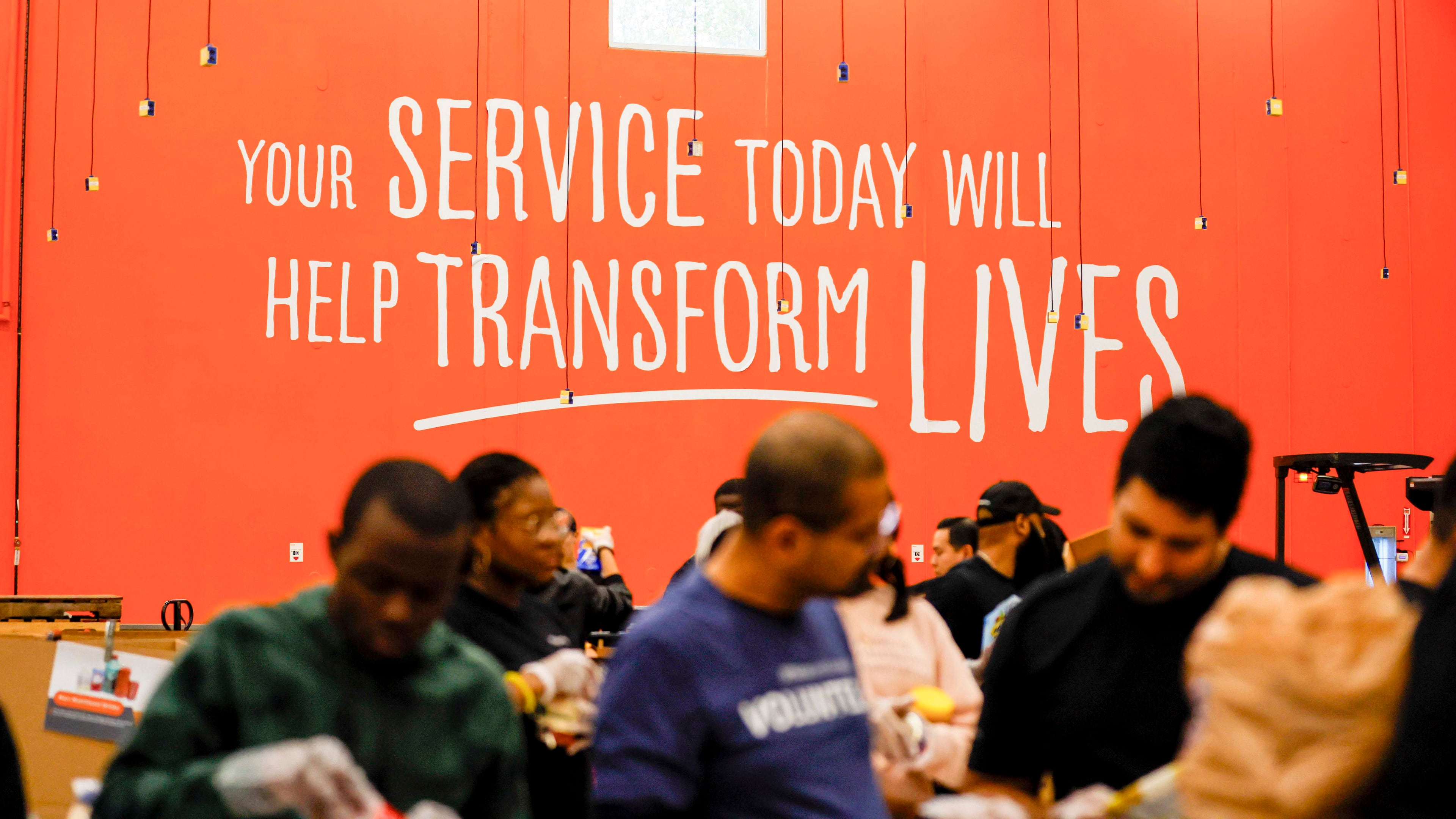 Volunteers are seen packing food at the Hunger Action Center at the Atlanta Community Food Bank Distribution Center on Wednesday, October 29, 2025. (Miguel Martinez/AJC)