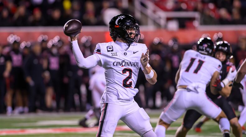 FILE - Cincinnati quarterback Brendan Sorsby (2) throws the football during the first half an NCAA college football game, Saturday against Utah, Nov. 1, 2025, in Salt Lake City, Utah. (AP Photo/Tyler Tate, File)