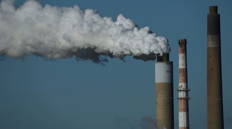 FILE - The Warrick Power Plant, a coal-powered generating station, operates April 8, 2025, in Newburgh, Ind. (AP Photo/Joshua A. Bickel, File)