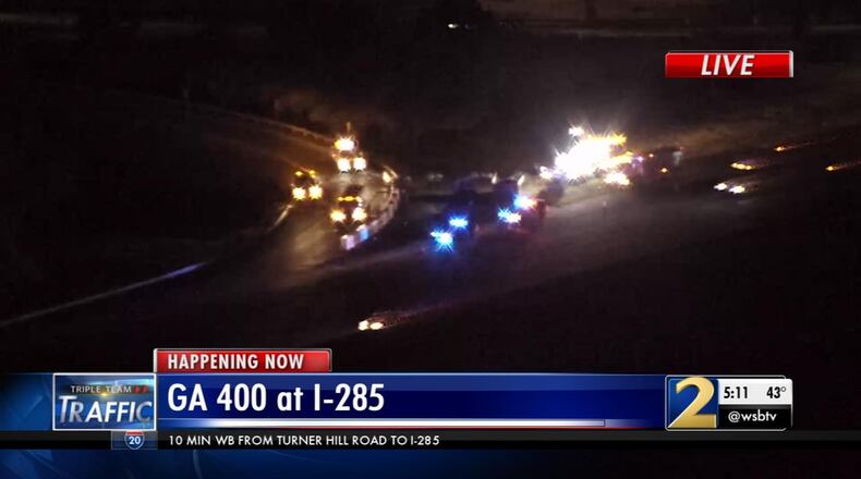 A truck hauling 40,000 pounds of chicken manure overturned Thursday on Ga. 400 in Sandy Springs.