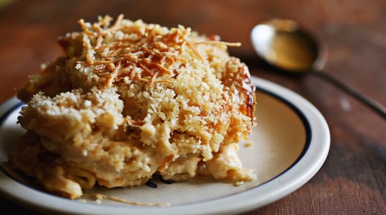This Beer-baked Macaroni and Cheese is adapted from the Rackhouse Pub in Denver. With two sticks of butter, two cups of half-and-half and five different cheeses, it is over-the-top good. (Juli Leonard/Raleigh News & Observer/TNS)