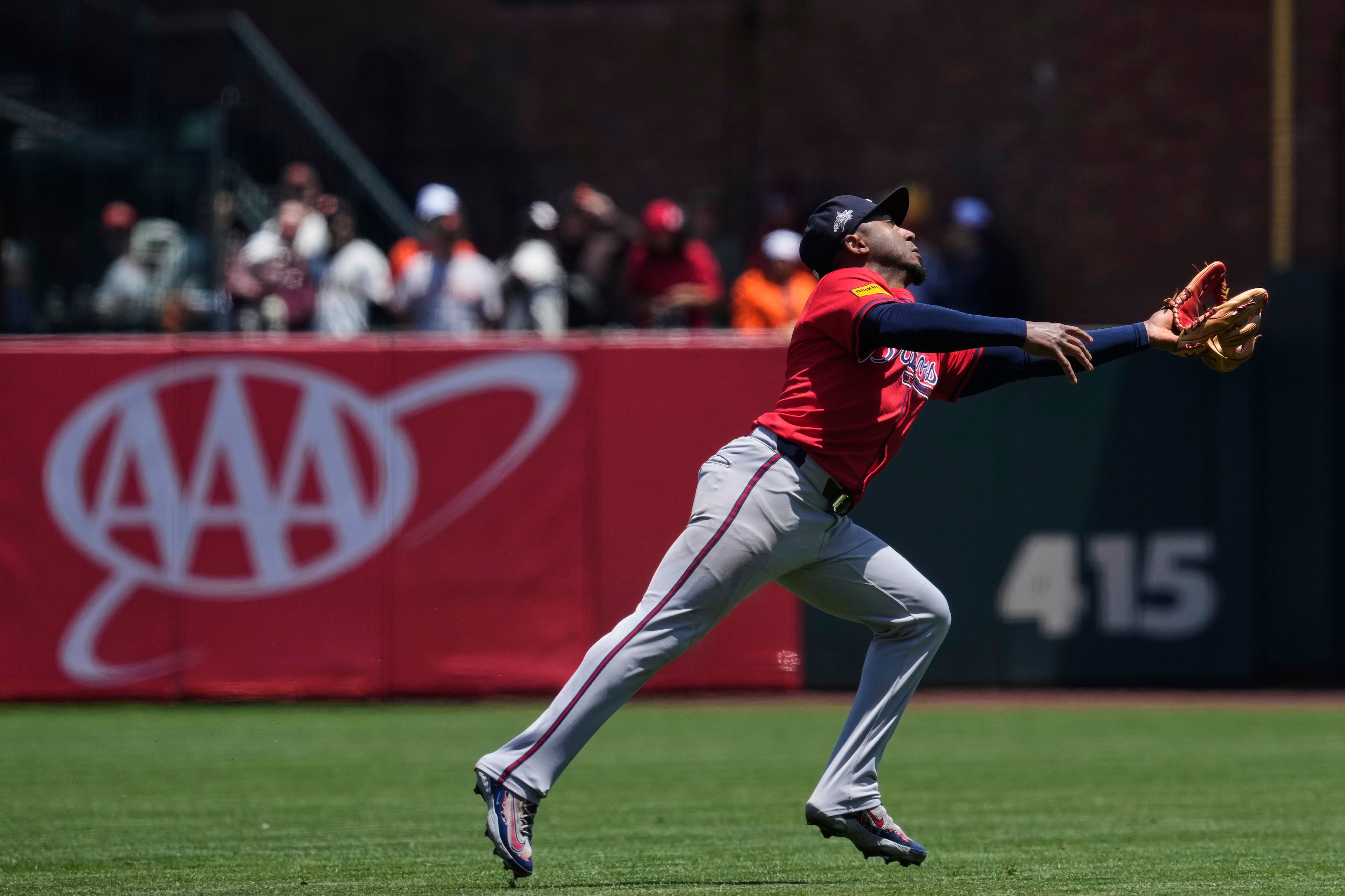Atlanta Braves second baseman Ozzie Albies catches a popup hit by San Francisco Giants' Willy Adames during the second inning of a baseball game Saturday, June 7, 2025, in San Francisco. (AP Photo/Godofredo A. Vásquez)