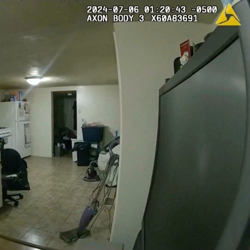 FILE - In this image taken from body camera video released by Illinois State Police on Monday, July 22, 2024, former Sangamon County Sheriff's Deputy Sean Grayson, left, points his gun at Sonya Massey, who called 911 for help, before shooting and killing her inside her home in Springfield, Ill., July 6, 2024. (Illinois State Police via AP, file)