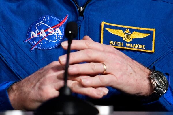 Astronaut Butch Wilmore talks to reporters during a press conference at Johnson Space Center on Monday, March 31, 2025, in Houston. (AP Photo/Ashley Landis)