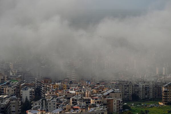 Smoke rises following an Israeli airstrike on Dahiyeh, in the southern suburb of Beirut, Lebanon, Friday, March 28, 2025. (AP Photo/Hassan Ammar)