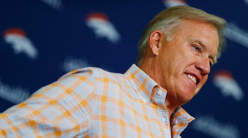 File--In this Monday, April 24, 2017, file photograph, John Elway, general manager of the Denver Broncos, talks about the team's plans in the upcoming NFL Draft during a news conference at the team's headquarters in Englewood, Colo. (AP Photo/David Zalubowski, file)