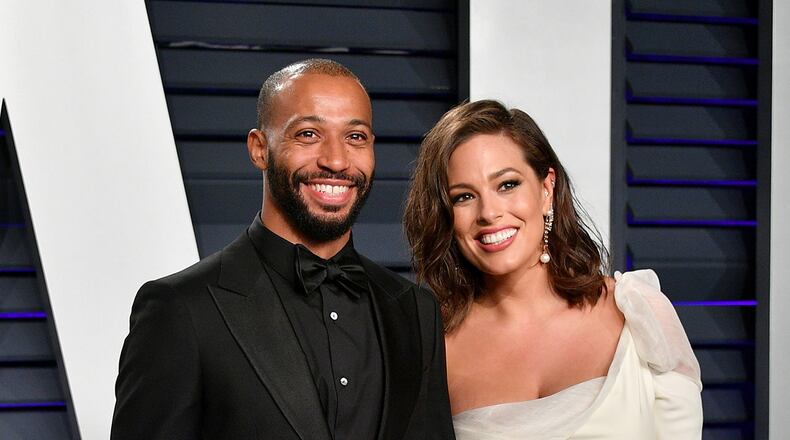 Justin Ervin (L) and Ashley Graham are expecting thier first child.