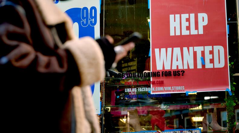 Georgia ended the year with big job gains, although December's growth. The new year holds many uncertainties, from inflation to omicron, but experts are optimistic. (Gabby Jones/The New York Times)