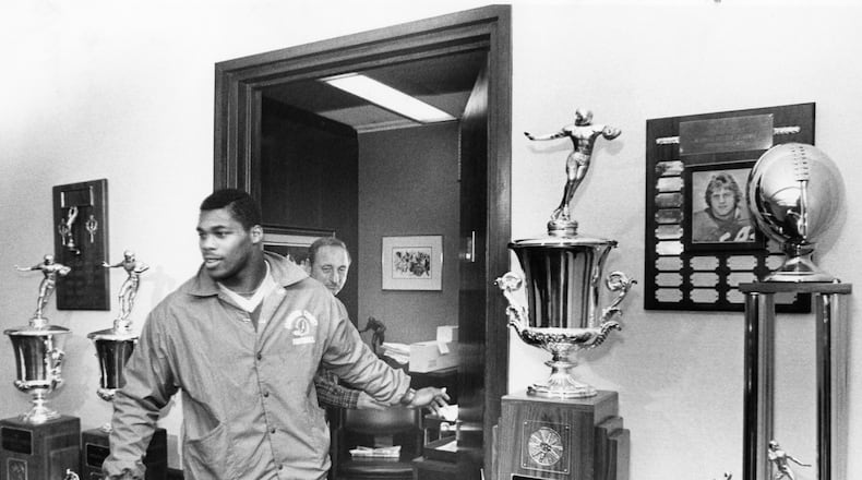 Herschel Walker leaves Vince Dooley's office after a meeting. W.A. Bridges Jr. / AJC file photo