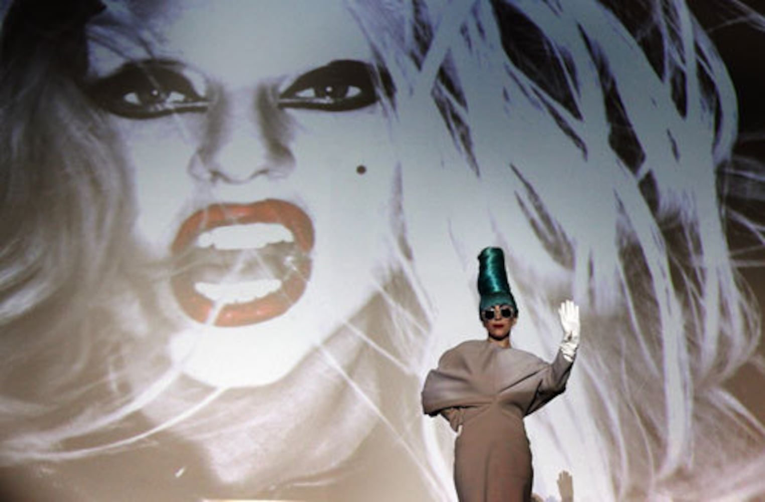 Lady Gaga rocks a green beehive in Singapore