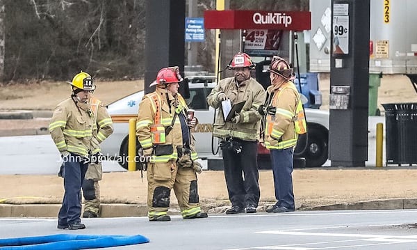 Crews worked to siphon off the remaining 5,000 gallons of gasoline in the fuel truck.