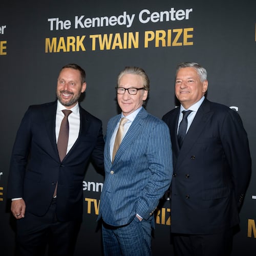 From left, Michael Kives, Comedian and political satirist Bill Maher, and Ted Sarandos pose on the red carpet for the 27th Annual Mark Twain Prize for American Humor Celebrating Bill Maher, Sunday, June 29, 2026, in Washington. (AP Photo/Kevin Wolf)