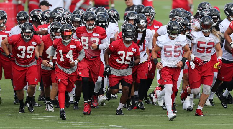 The Atlanta Falcons take to the field for the first day of training camp Thursday, July 28, 2016, in Flowery Branch.