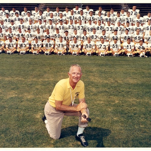 Legendary Georgia Tech football coach Bobby Dodd poses with his 1966 team for a preseason photo. (Photo courtesy of Georgia Tech Digital Archives)