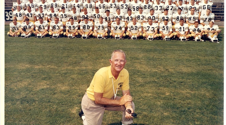 Legendary Georgia Tech football coach Bobby Dodd poses with his 1966 team for a preseason photo. (Photo courtesy of Georgia Tech Digital Archives)