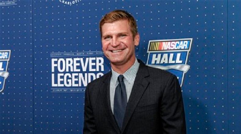 Clint Bowyer poses for photographers on the red carpet before the NASCAR Hall of Fame Induction ceremony in Charlotte, N.C., Friday, Jan. 20, 2017. (AP Photo/Mike McCarn)
