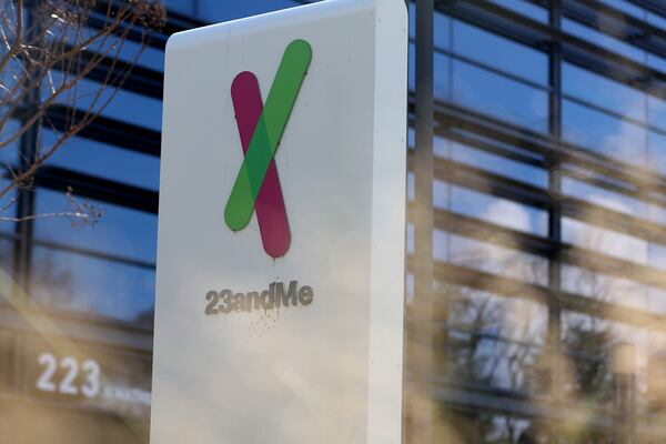A sign is posted in front of the 23andMe headquarters on Feb. 1, 2024, in Sunnyvale, California. Genetic testing company 23andMe, once valued at $6 billion, is facing the possibility of delisting from NASDAQ as the company navigates numerous class action lawsuits. (Justin Sullivan/Getty Images/TNS)