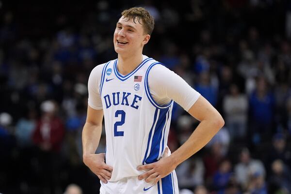 FILE - Duke forward Cooper Flagg (2) reacts after Duke beat Alabama in an Elite Eight round NCAA college basketball tournament game, Saturday, March 29, 2025, in Newark, N.J. (AP Photo/Frank Franklin II, File)